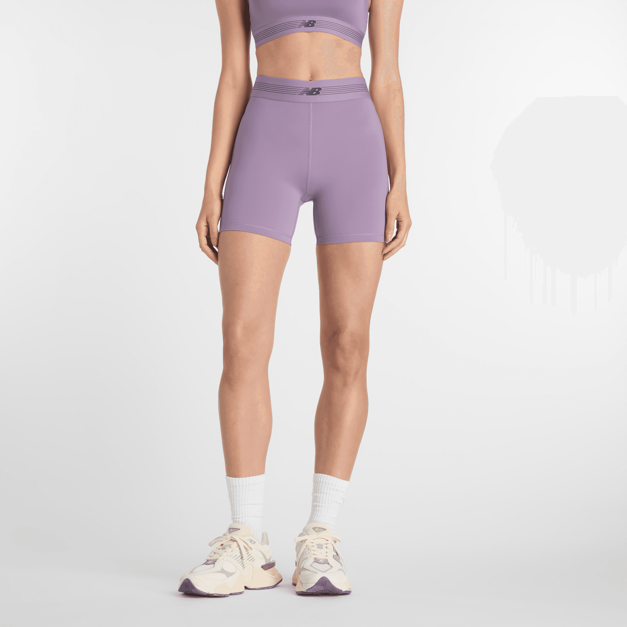 Spodenki damskie New Balance AC WB61E4GEAA5 – fioletowe